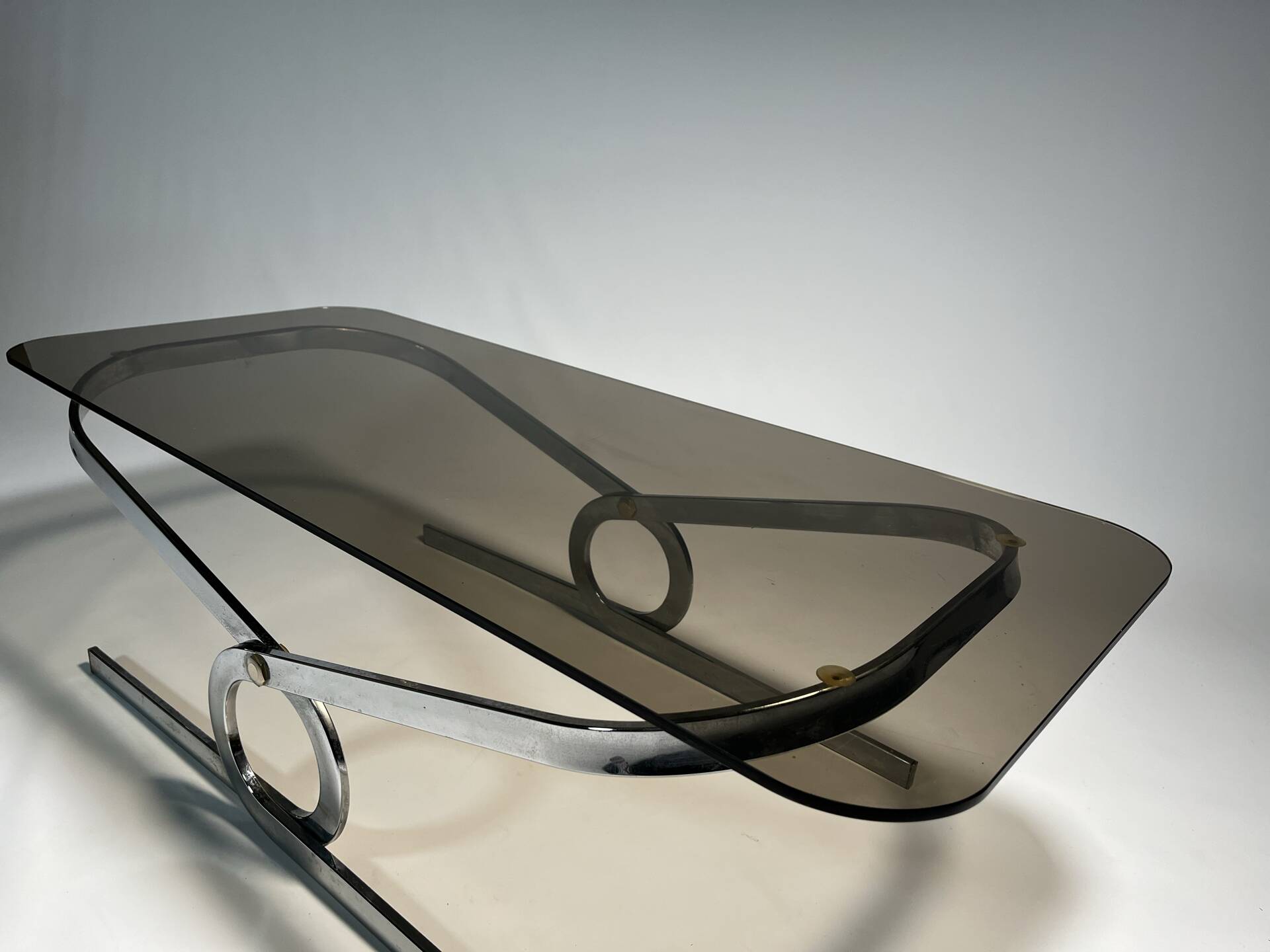 Vintage coffee table in chrome and smoked glass, 1970s.