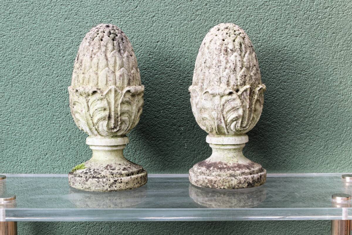 Pair of pine cones in reconstituted stone