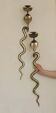 Pair of Neo-Egyptian Style Engraved Brass Wall Sconces Featuring Cobras