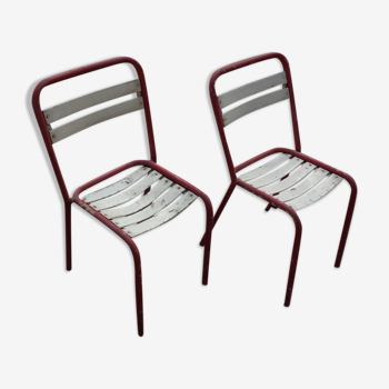 Duo of sheet metal bistro chairs