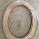 Oval frame in wood and gilded stucco