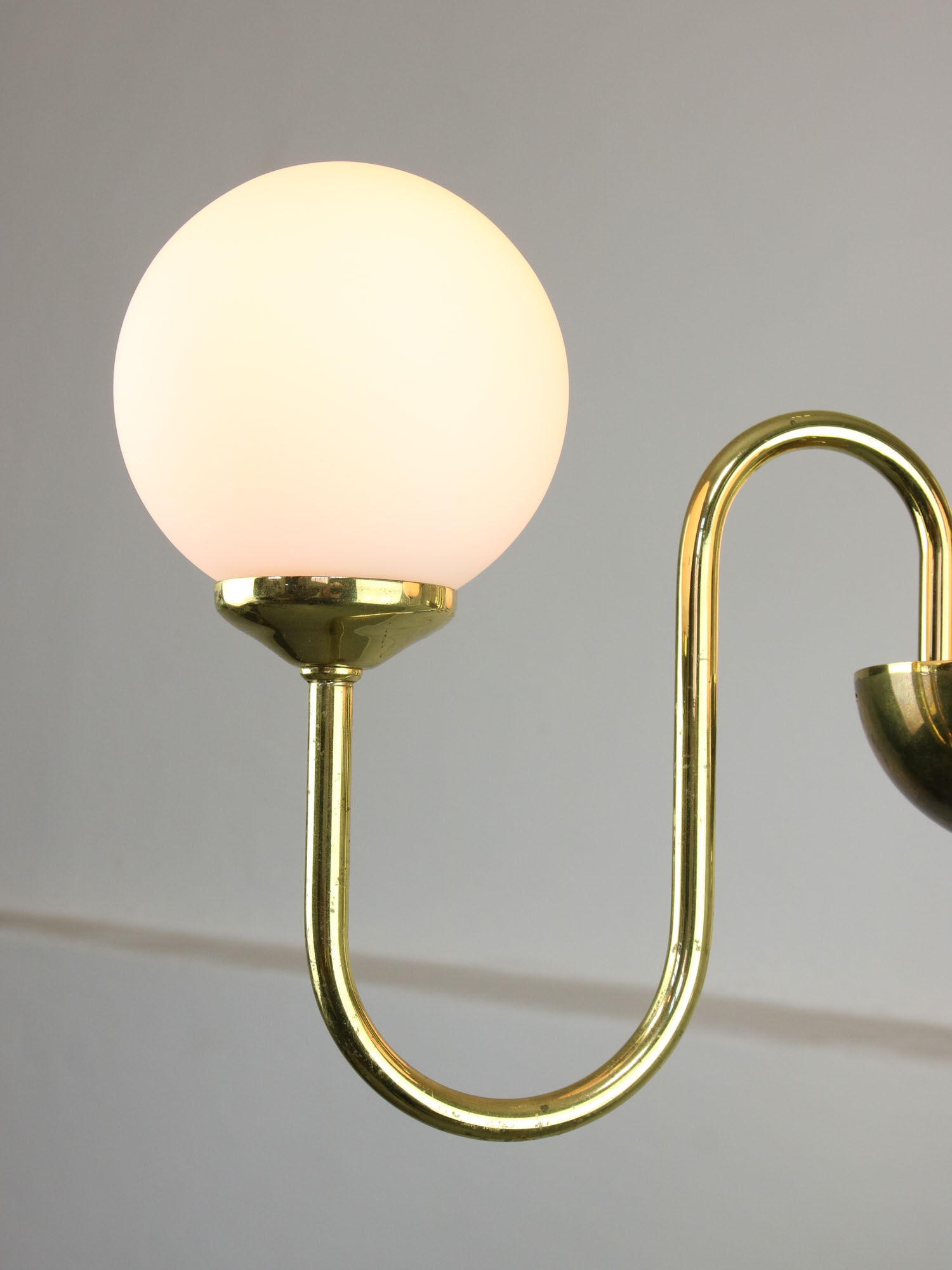 Vintage golden chandelier in opaline glass
