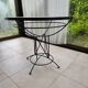 Round dining table "Atomic Age" in wrought iron and glass – 1950s/60s