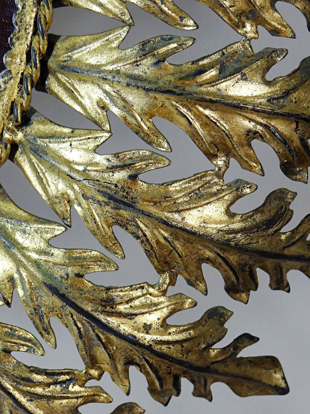 Large Italian sunburst wall mirror in gilded metal, 1960s-70s.