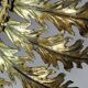 Large Italian sunburst wall mirror in gilded metal, 1960s-70s.