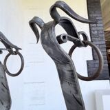 Pair of zoomorphic metal andirons "dogs" 1950