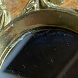 Small antique bronze mirror