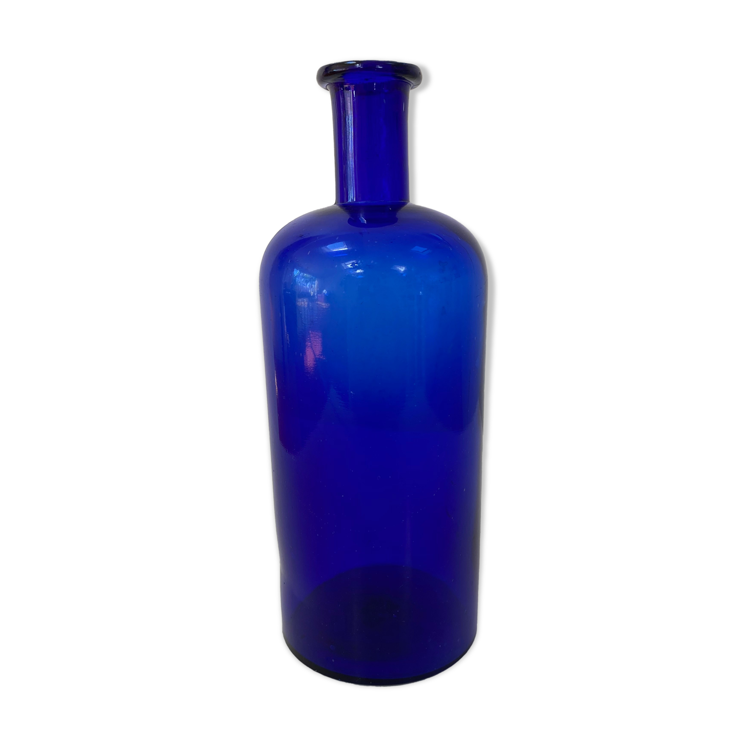 Cobalt blue glass pharmacy bottle