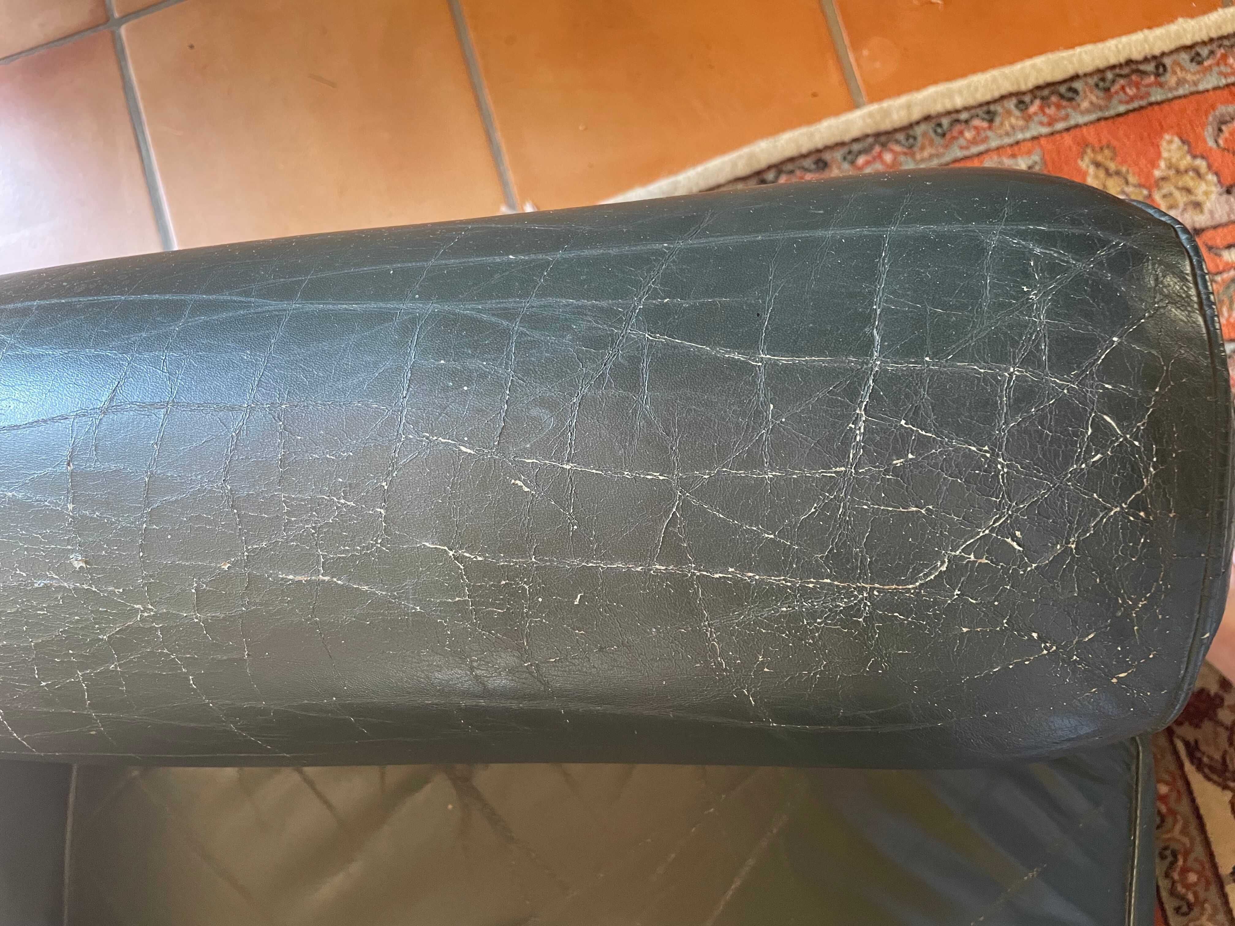 Green leather club chairs