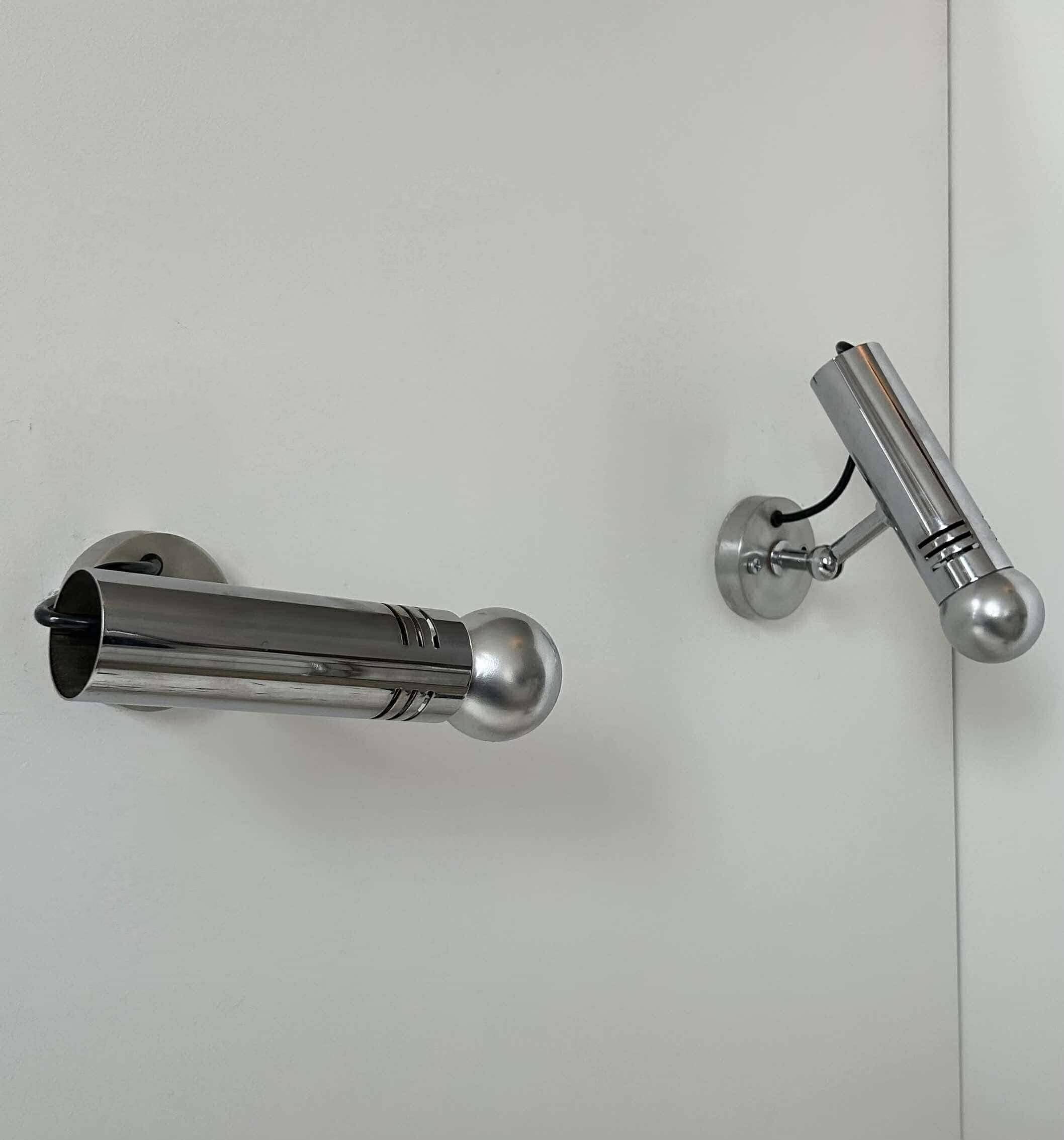 Pair of vintage adjustable wall lights, chromed metal, France 1970