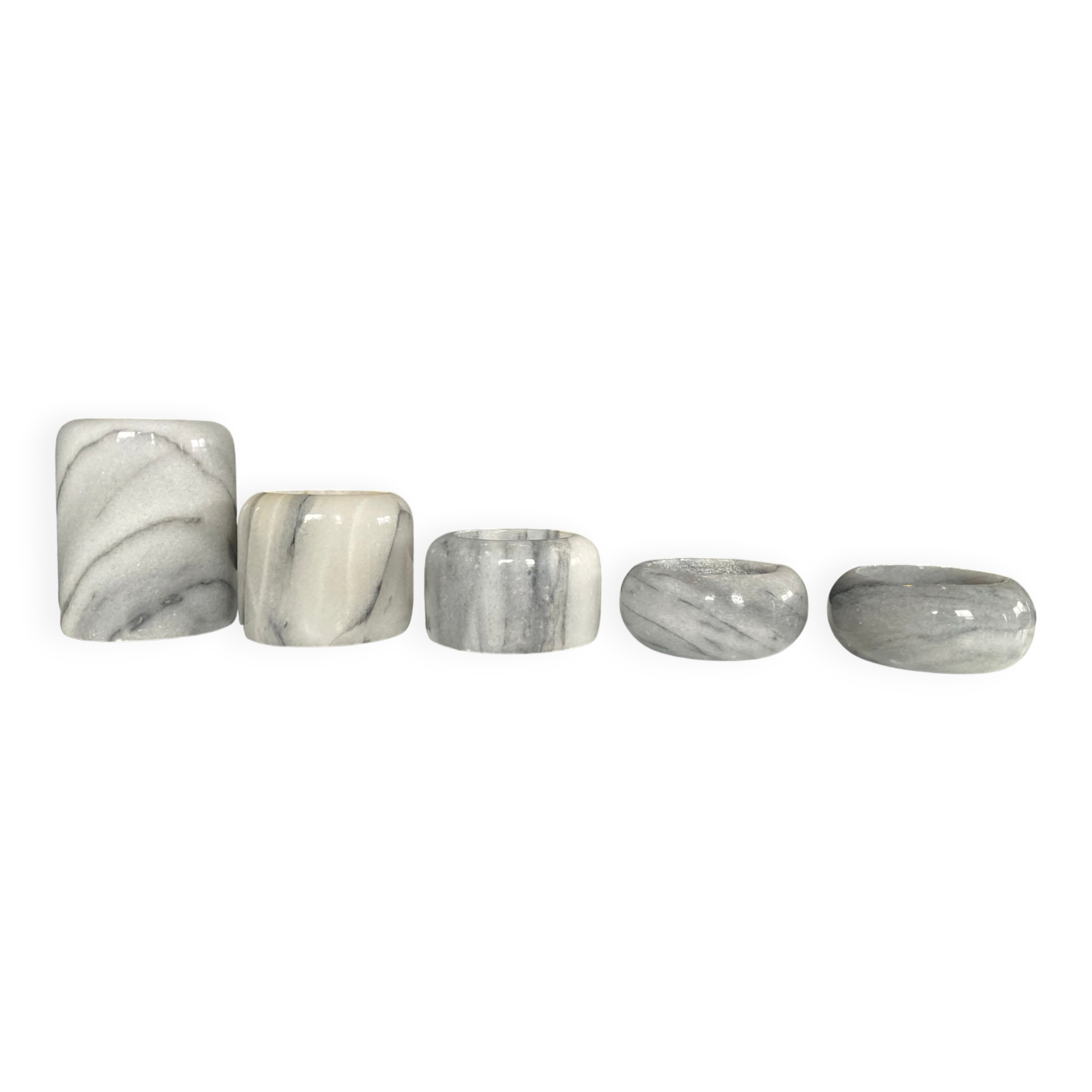 Set of 5 nesting candle holders in white marble.
