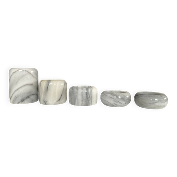 Set of 5 nesting candle holders in white marble.