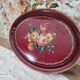 Russian plate in painted sheet metal burgundy old pink decoration and golden frieze