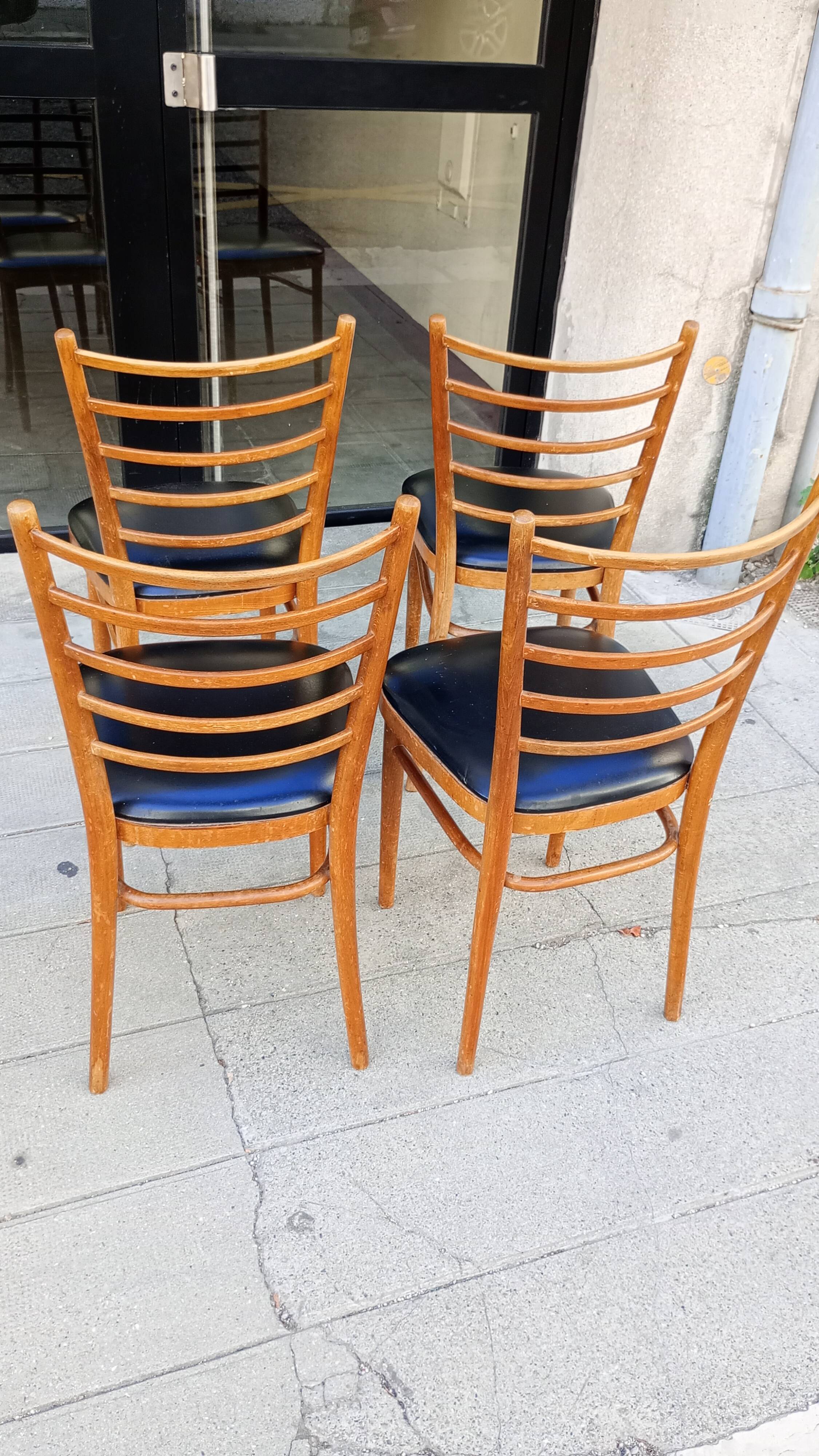 Lot of four antique chairs. Bistro. 1960.