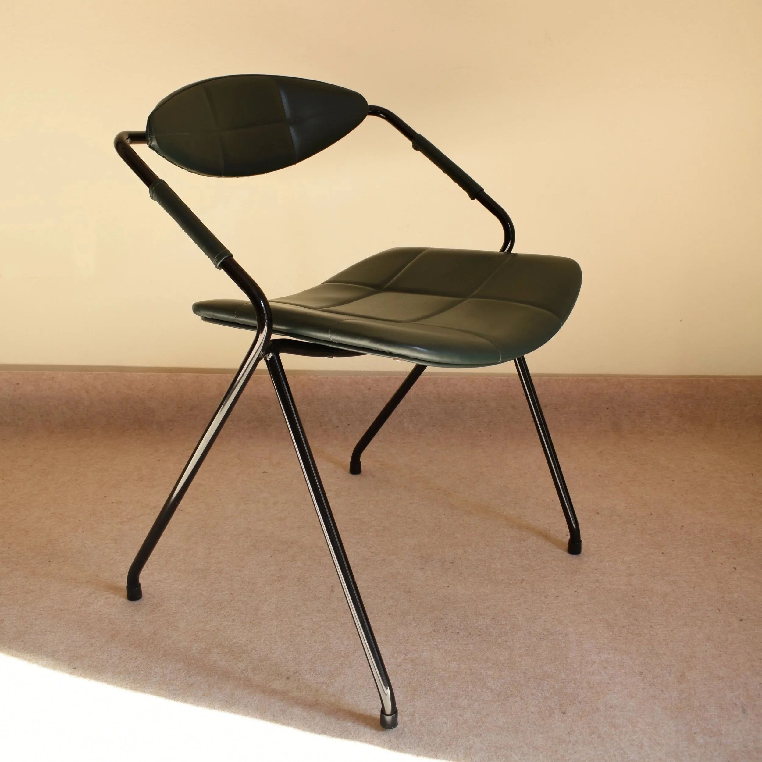 Set of three "Rugby" model chairs by Gilbert Steiner for Steiner, 1962.