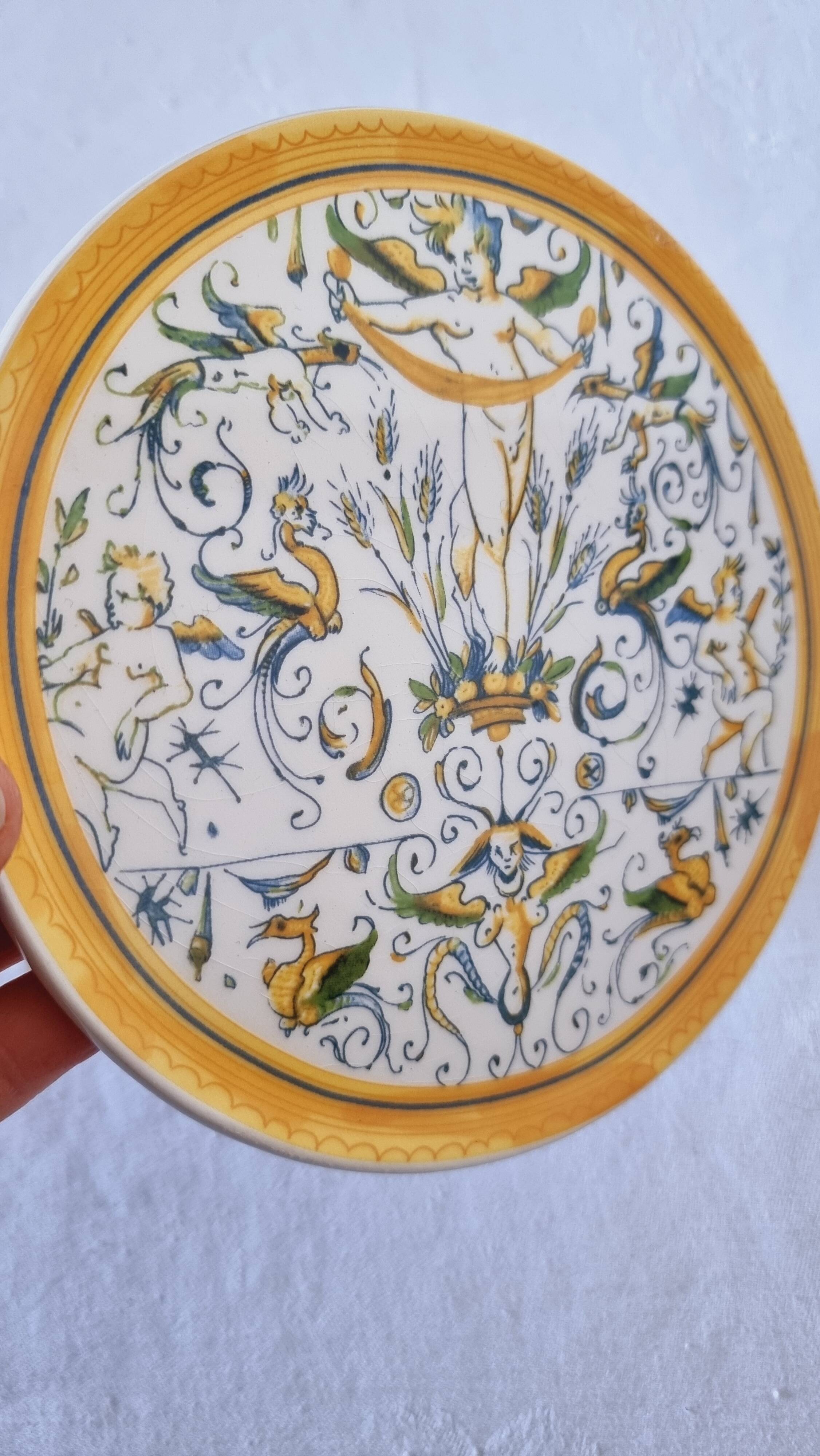 Vintage Italian raised plate in hand-painted ceramic.