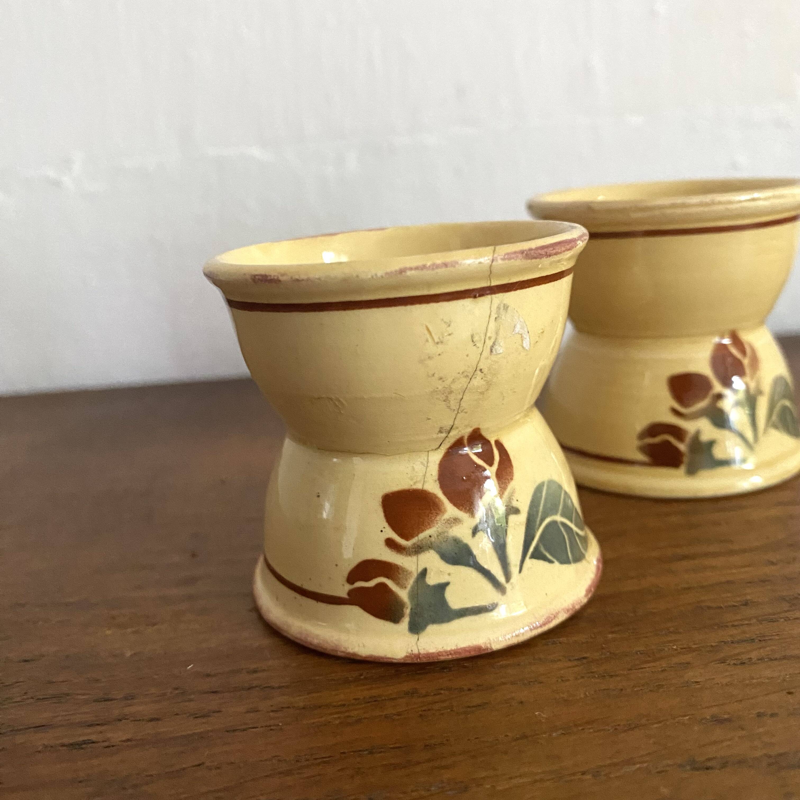 Antique diabolo egg cups