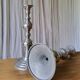 Pair of antique chrome metal candlesticks
