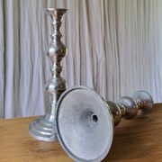 Pair of antique chrome metal candlesticks