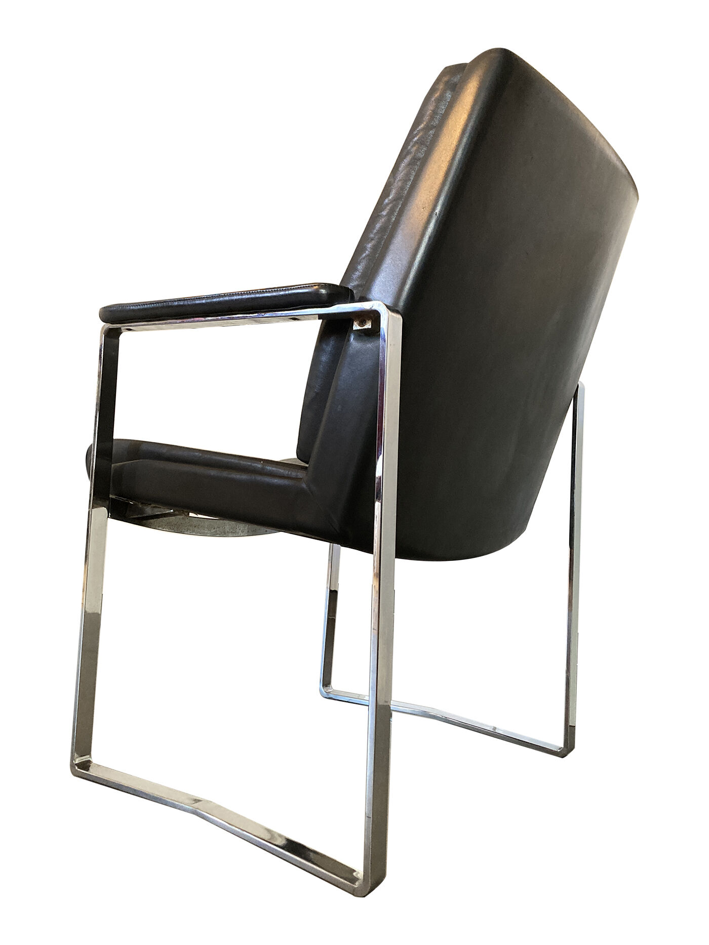 Armchair, office chair. Leather and chrome-plated steel. 1980