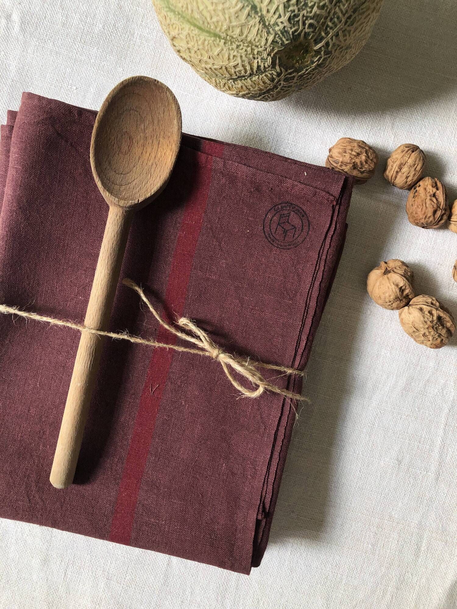 Set of two old tea towels in pure linen tinted in burgundy