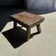 Small stool, rectangular solid teak side table with curved legs.
