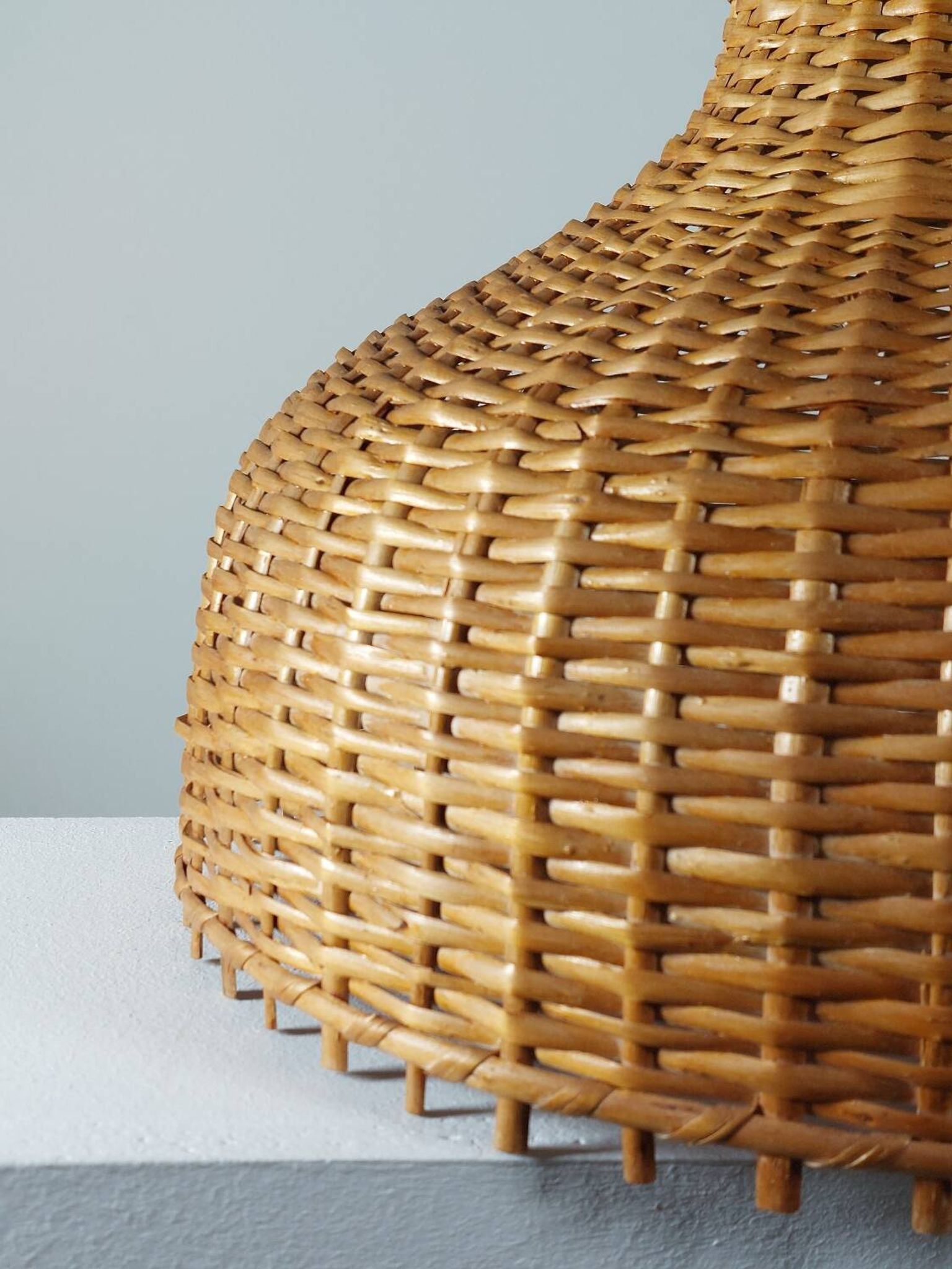 Vintage rattan lampshade from the 70s, mid-century style.