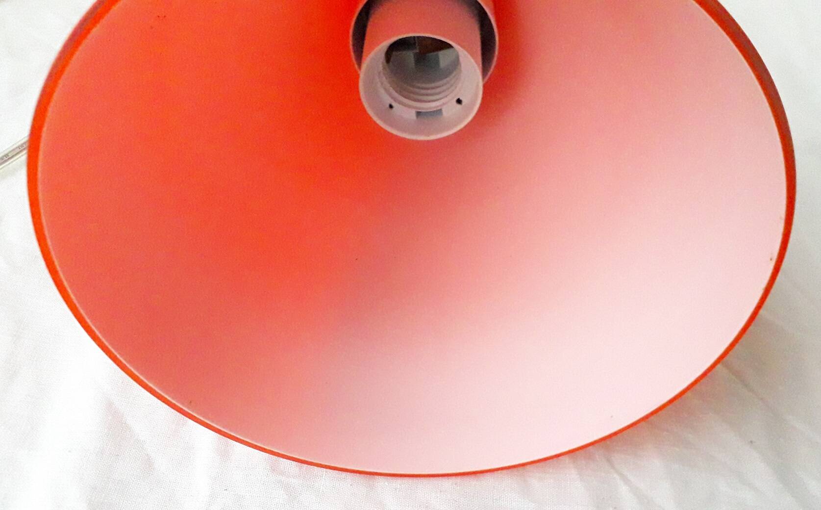 Orange glass suspension