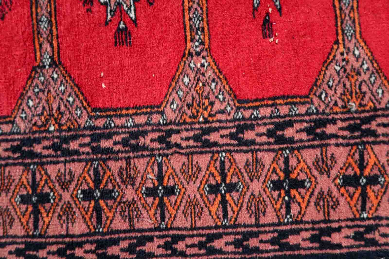 Vintage carpet Uzbek Bukhara handmade 62cm x 106cm 1970s