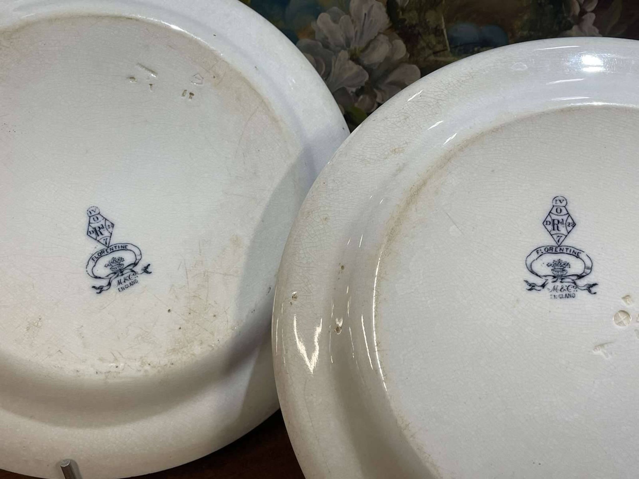 Pair of round Minton English porcelain dishes, Florentine pattern