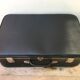 Old black suitcase with reinforcements & vintage bakelite handleOld suitcase black travel trunk + backup & handle bakelite vintage