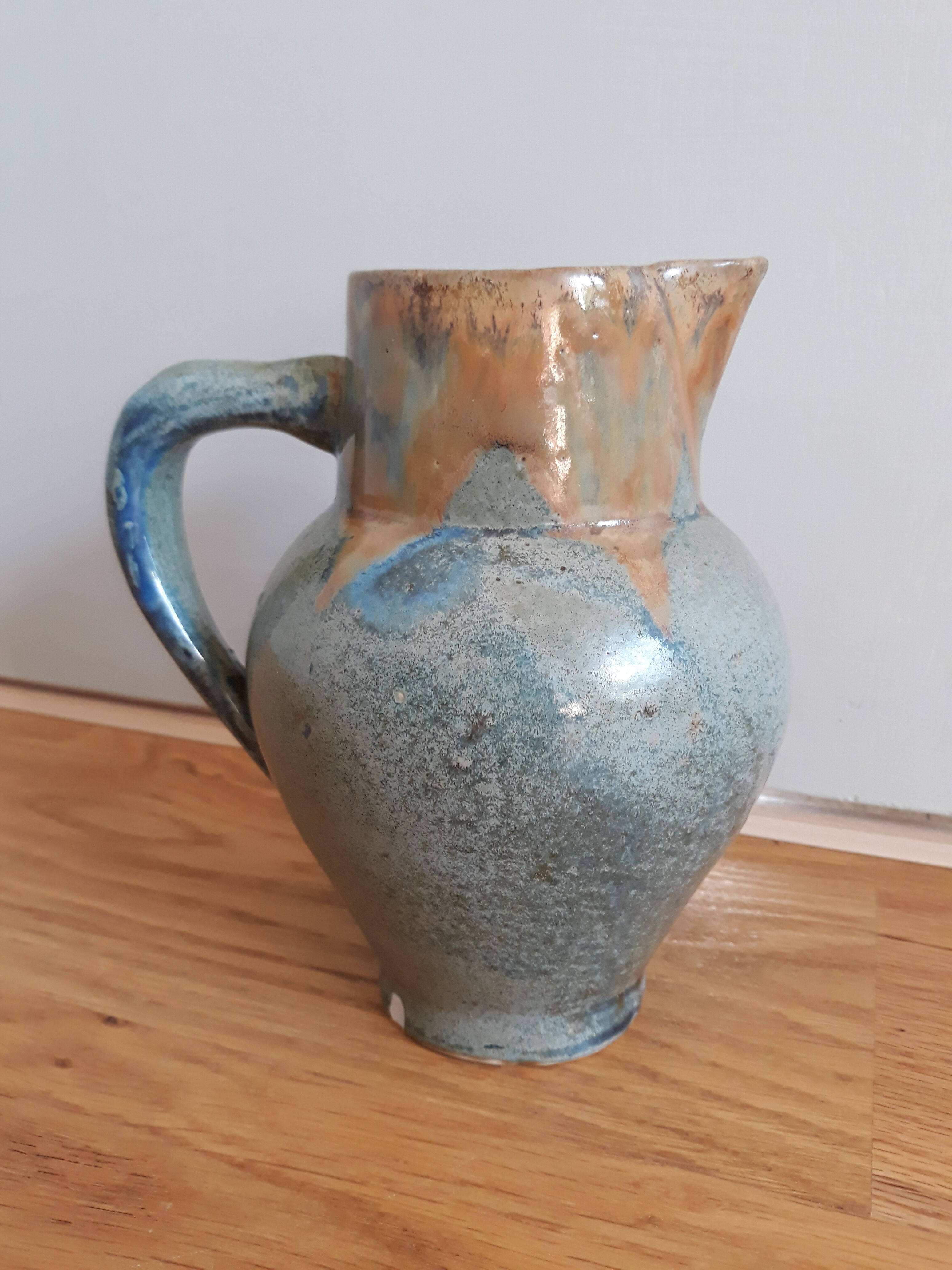 Pitcher ceramic  tones blue, green and caramel
