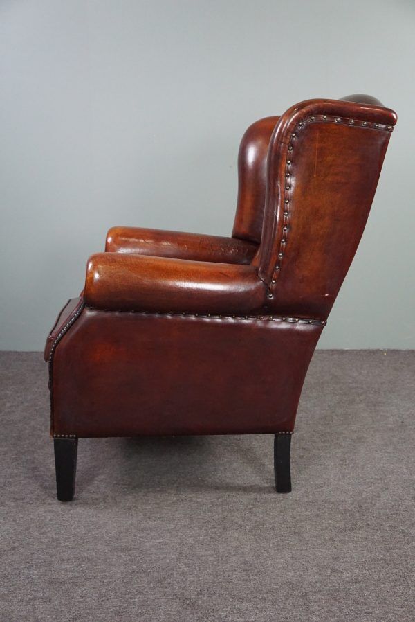 Patinated sheepskin armchair