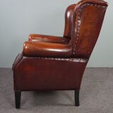 Patinated sheepskin armchair