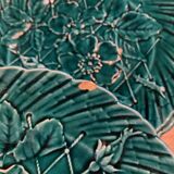 Set of 10 green earthenware dessert plates with a finely embossed floral pattern