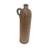 Bottle in sandstone