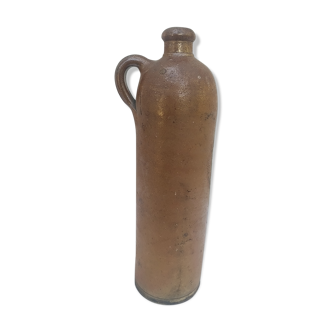 Bottle in sandstone