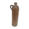 Bottle in sandstone