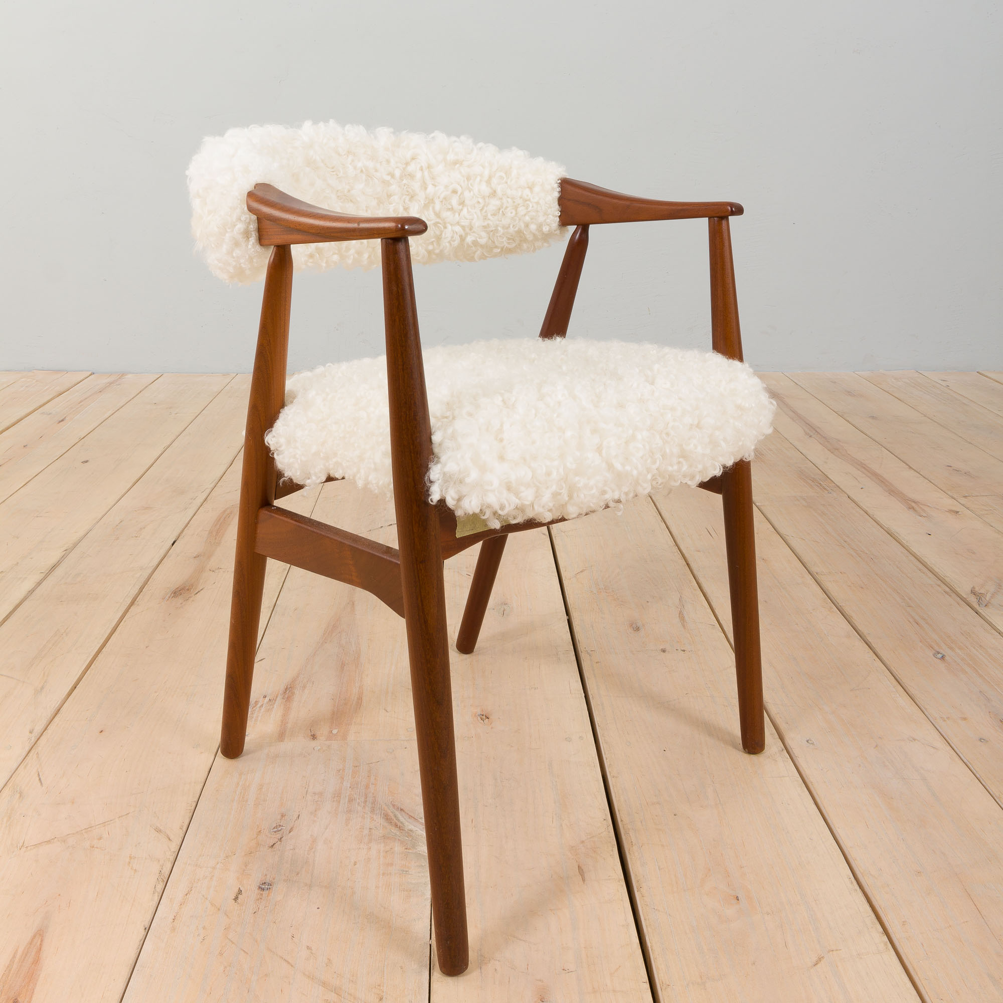 Th. Herlev, Farstrup solid teak chair in natural sheepskin upholstery, Denm