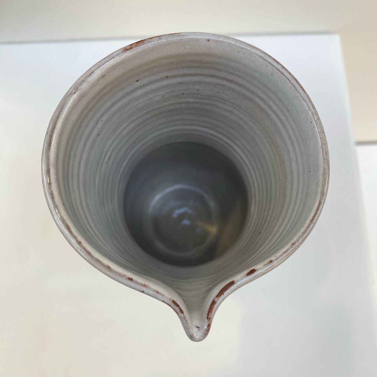 Enameled stoneware pitcher by Jeanne and Norbert Pierlot