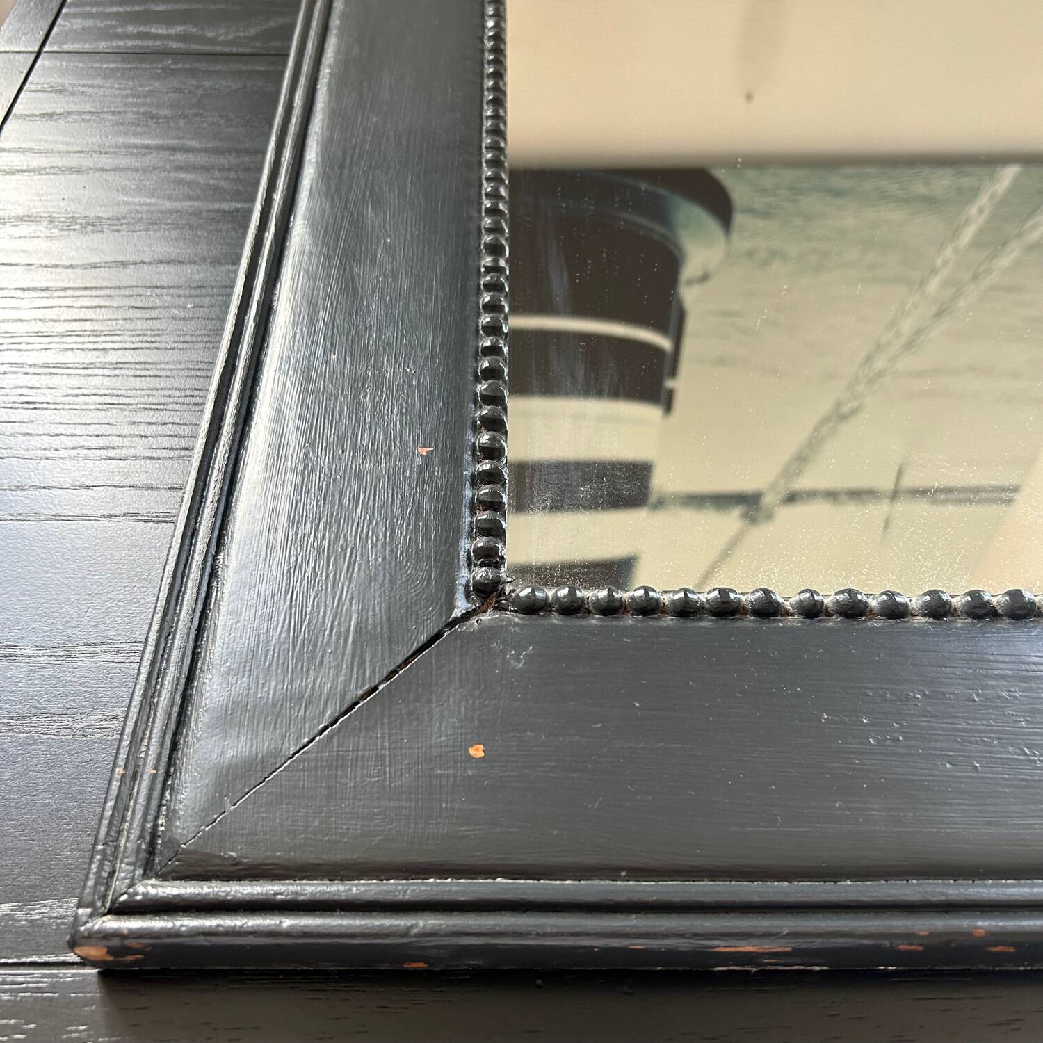 Pearled black frame mirror