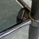 Vintage 1950s silver metal bar cart with wheels and two glass shelves