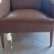 a pair of comfortable vintage armchairs with splayed legs