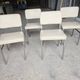 4 chrome metal chairs with faux leather from the 1970s.