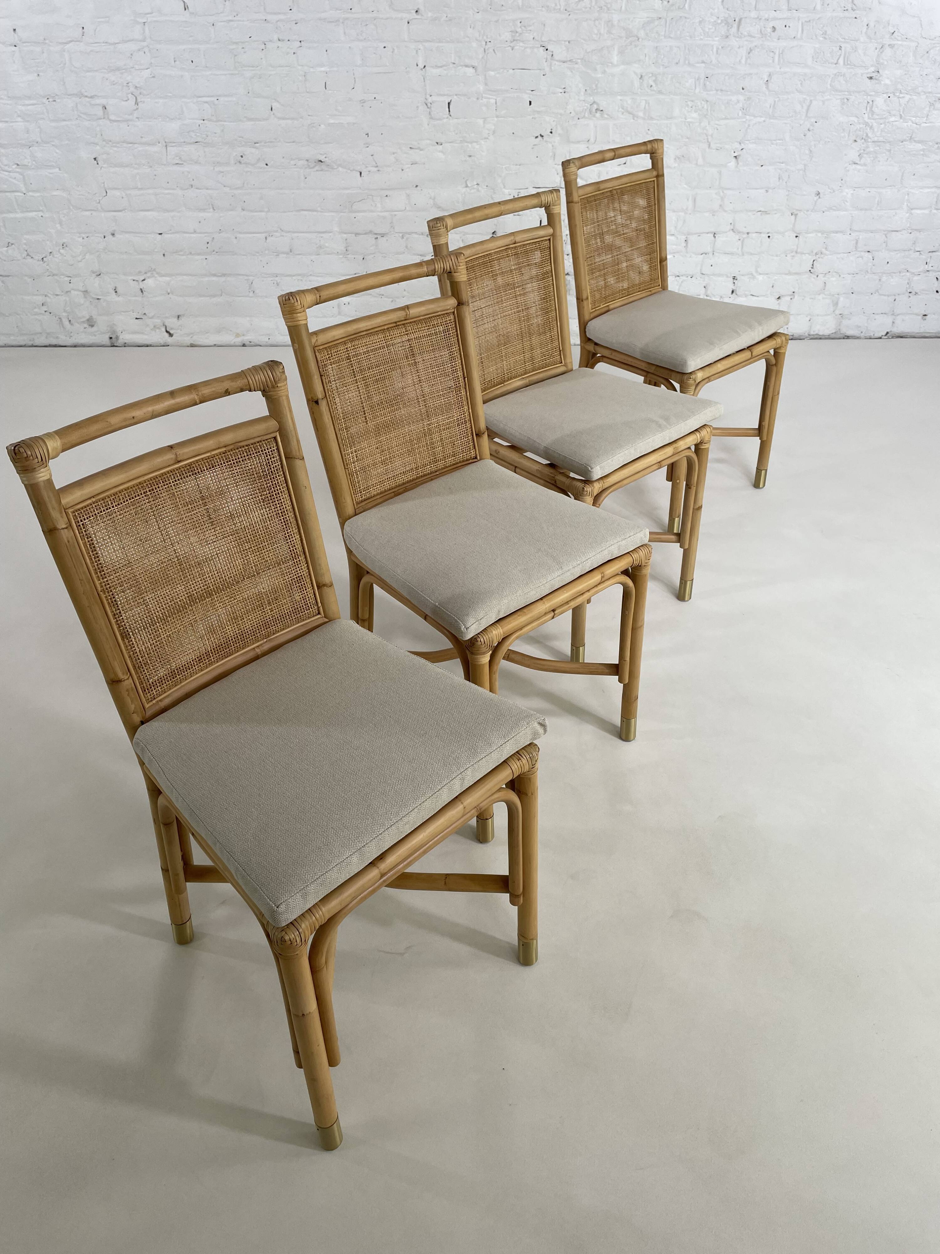 Suite de 4 chaises en rotin cannage et laiton