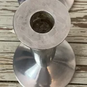 Pair of minimalist polished aluminium candle holders