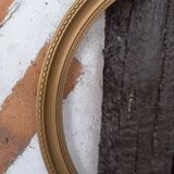 Round gilded glass frame