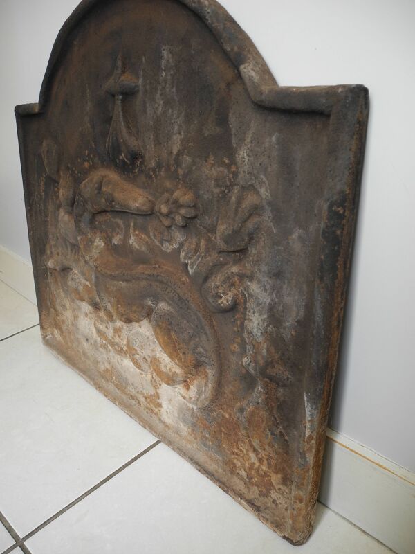 Ancienne plaque de cheminée en fonte salamandre