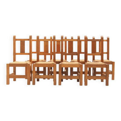 Ensemble de huit chaises en chêne massif faites à la main, années 1970.