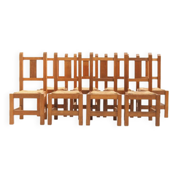 Ensemble de huit chaises en chêne massif faites à la main, années 1970.